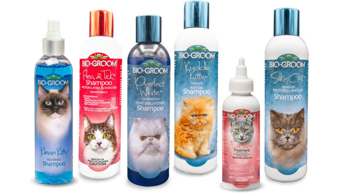 Bottles of six different Bio-Groom cat products arranged in a row.